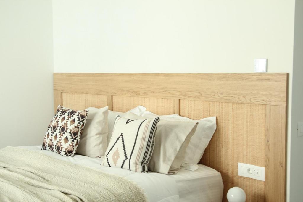 Postel nebo postele na pokoji v ubytování Elounda Katikia Luxury Living