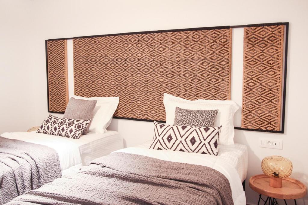 Postel nebo postele na pokoji v ubytování Elounda Katikia Luxury Living