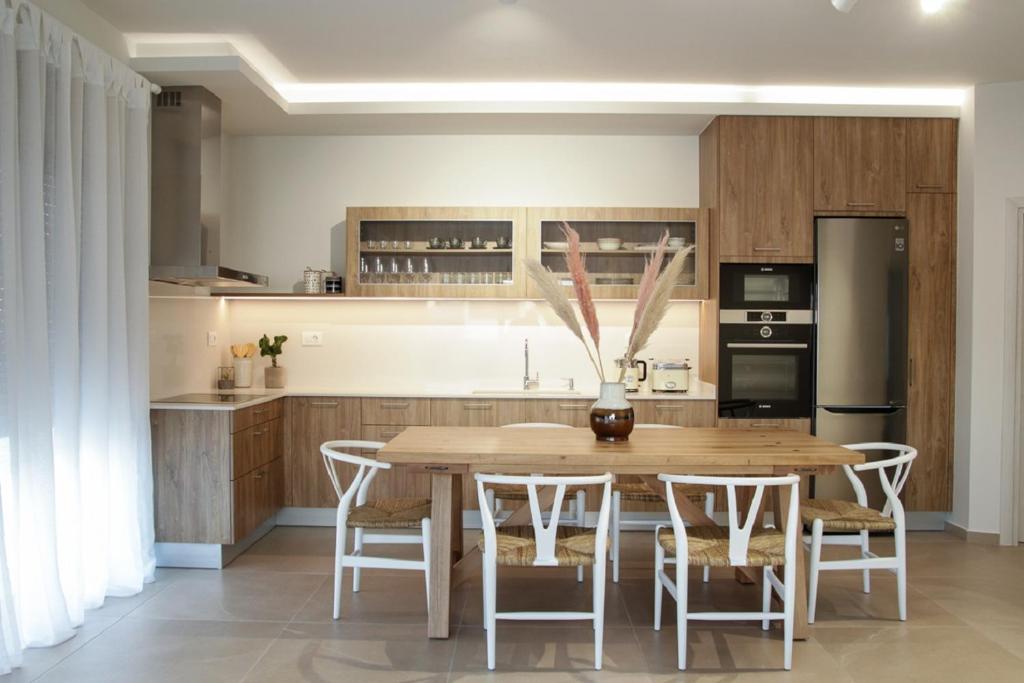 Kuchyň nebo kuchyňský kout v ubytování Elounda Katikia Luxury Living