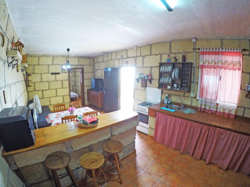 Kuchyň nebo kuchyňský kout v ubytování Finca Noya con piscina privada