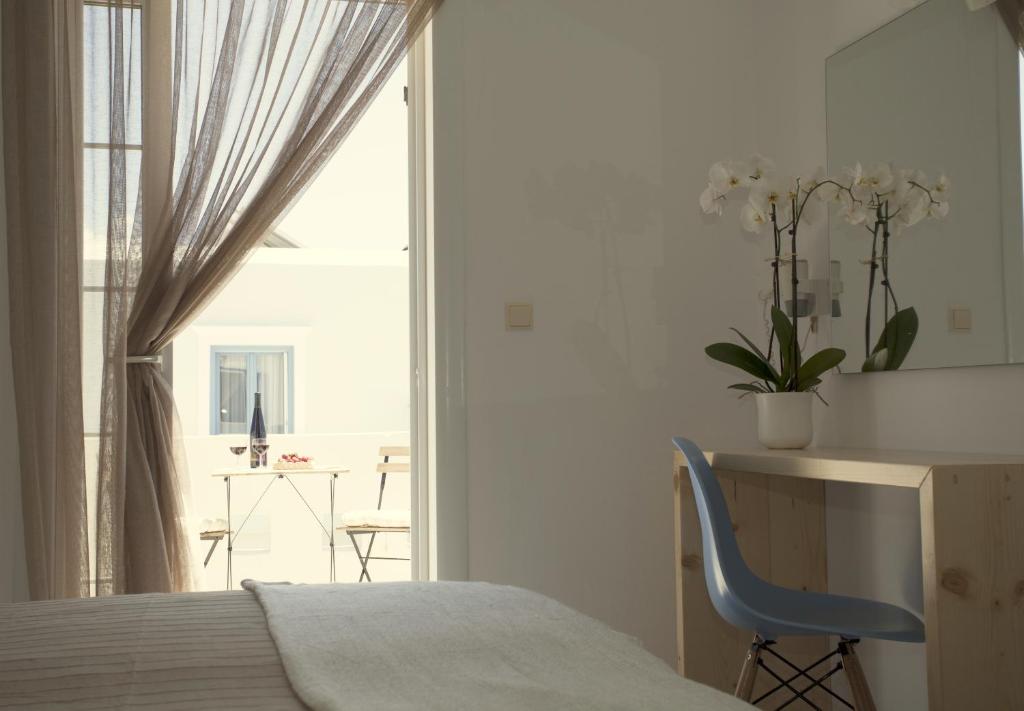 Postel nebo postele na pokoji v ubytování Hotel Semeli
