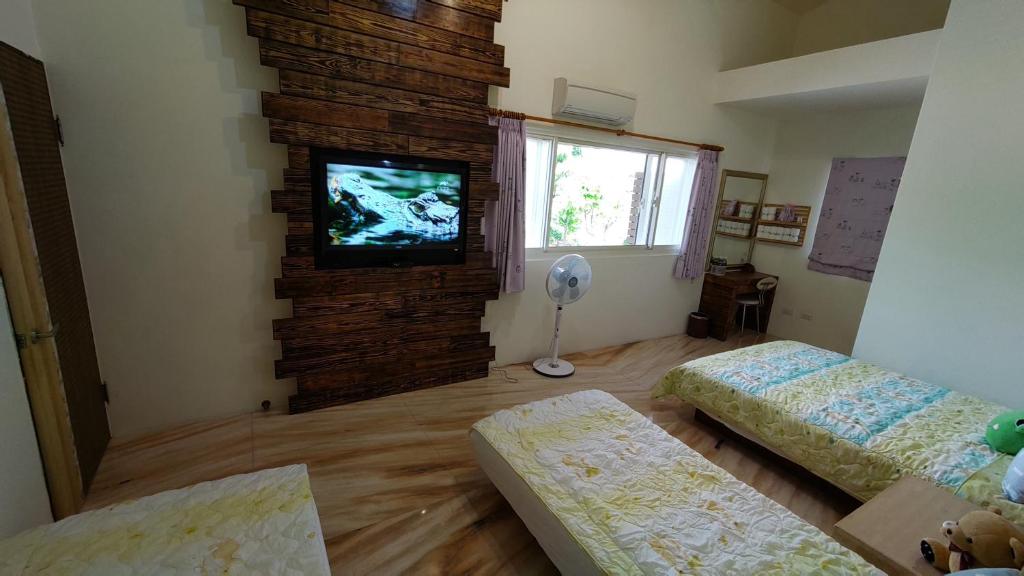 TV a/nebo společenská místnost v ubytování 鄉間雅築休閒民宿Country Villa Homestay