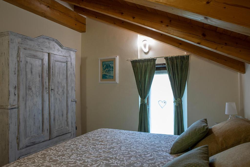 Postel nebo postele na pokoji v ubytování Ca di Nadia