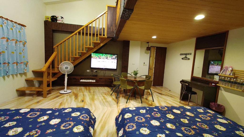 Postel nebo postele na pokoji v ubytování 鄉間雅築休閒民宿Country Villa Homestay