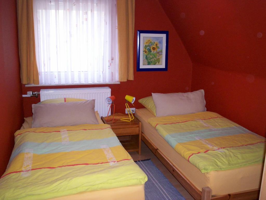 Postel nebo postele na pokoji v ubytování Das Steghaus