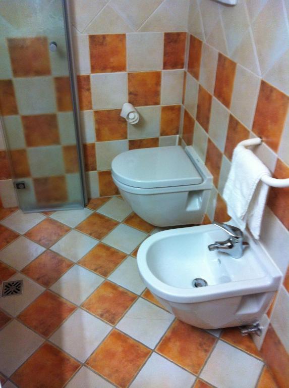 Koupelna v ubytování Piccolo Hotel Sciliar