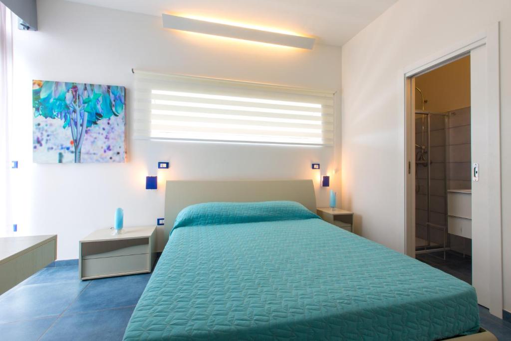 Łóżko lub łóżka w pokoju w obiekcie Fani Luxury Villas