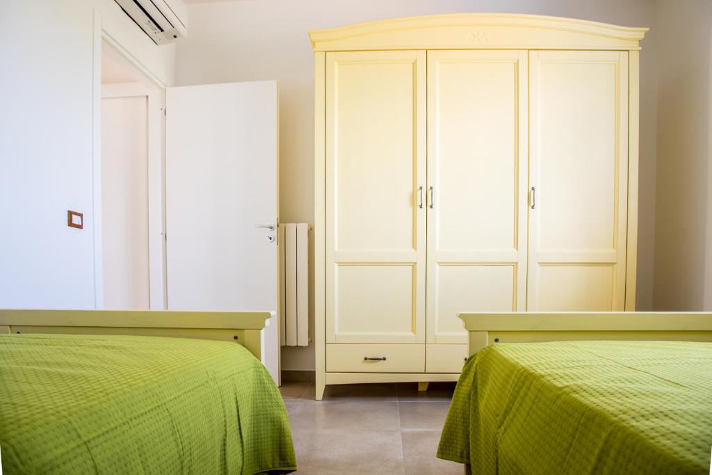 Łóżko lub łóżka w pokoju w obiekcie Fani Luxury Villas