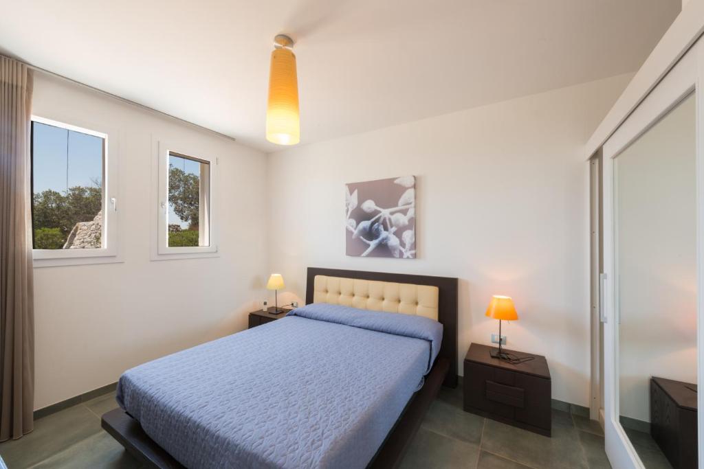 Łóżko lub łóżka w pokoju w obiekcie Fani Luxury Villas