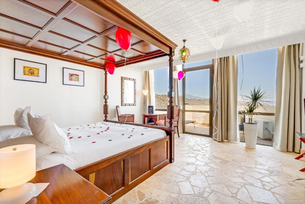 Posteľ alebo postele v izbe v ubytovaní Hotel Castillo de Monda