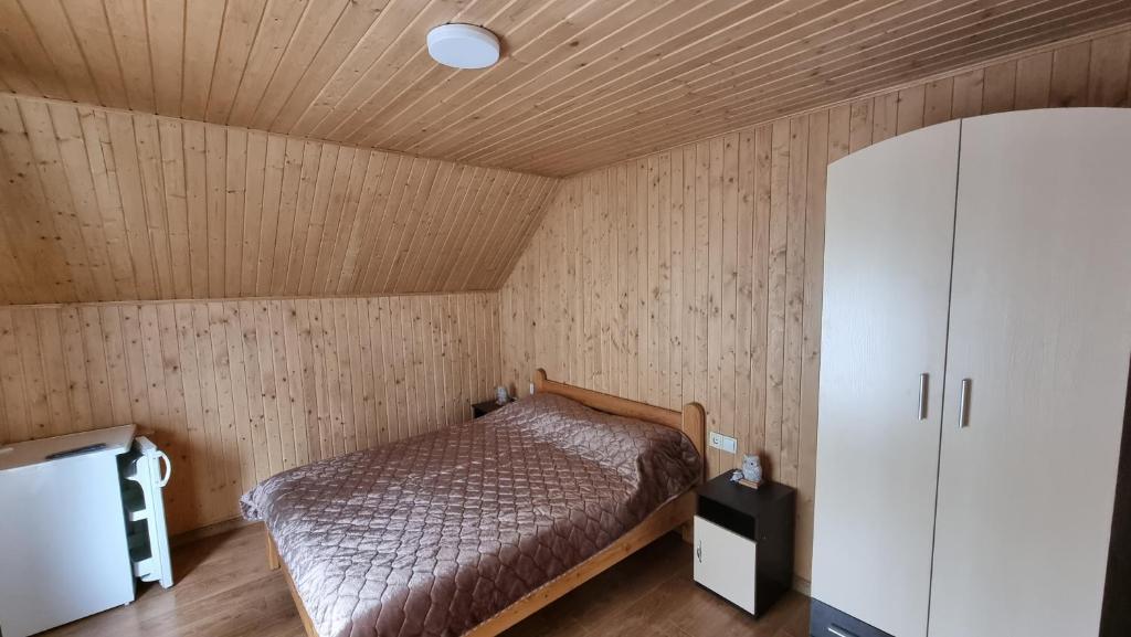 Llit o llits en una habitació de Villa Paraiso Karpaty