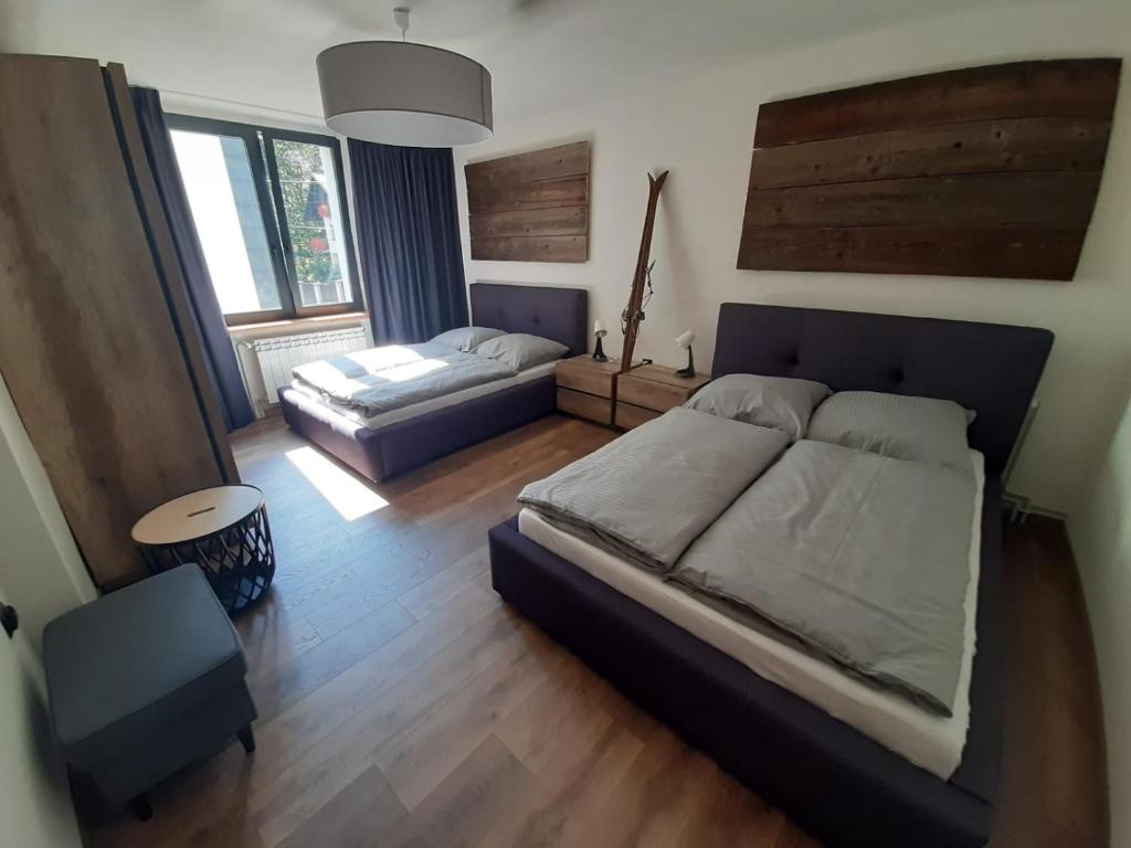 Posteľ alebo postele v izbe v ubytovaní Dom Minimal House