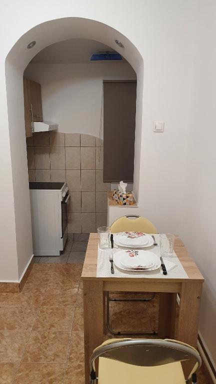 Kuchyň nebo kuchyňský kout v ubytování Apartament Cozy Orsova