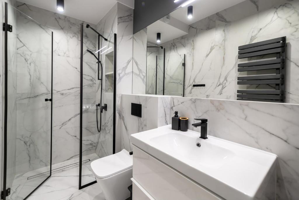 Koupelna v ubytování Apartamenty Kalinowa z sauną i bawialnią - Dream Apart
