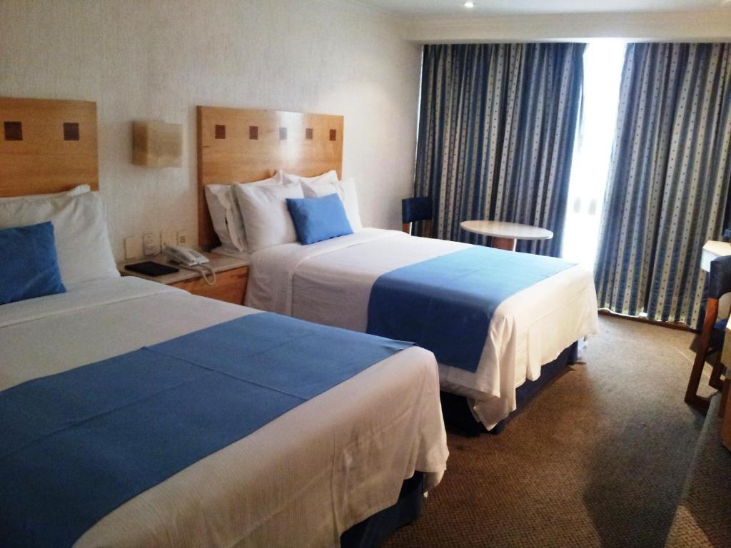 Cama o camas de una habitación en Hotel Stella Maris