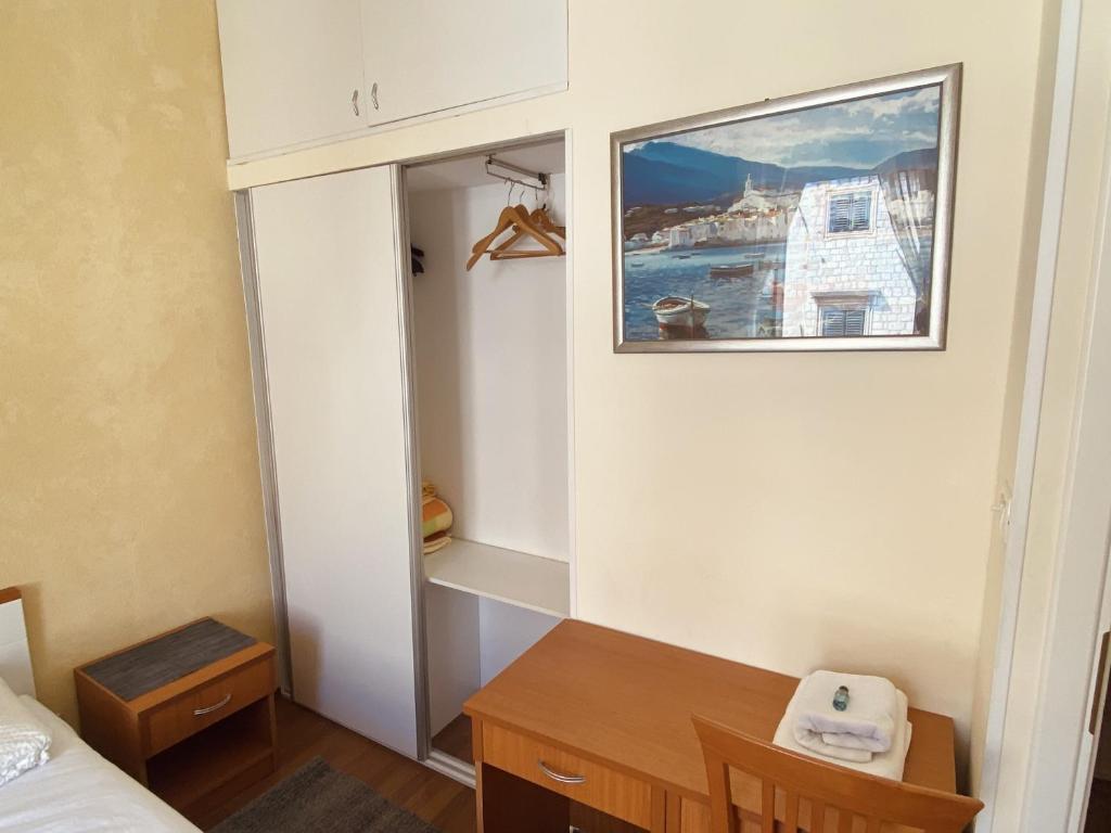 Postel nebo postele na pokoji v ubytování Apartment Tomasović Old Town