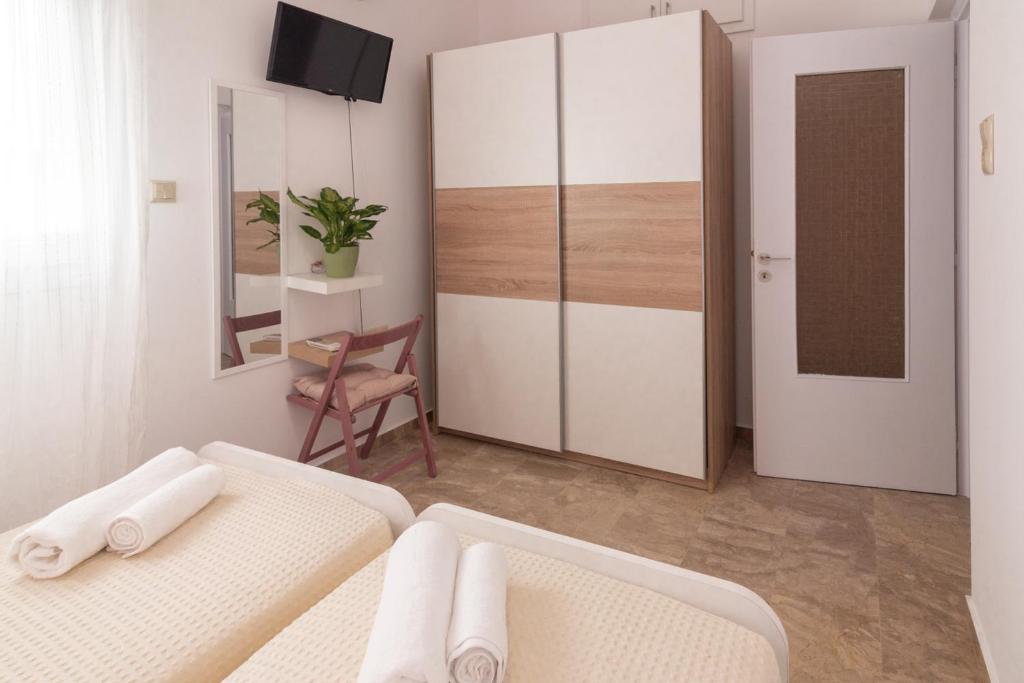Łóżko lub łóżka w pokoju w obiekcie Casa EleMar Villa with Private Yard