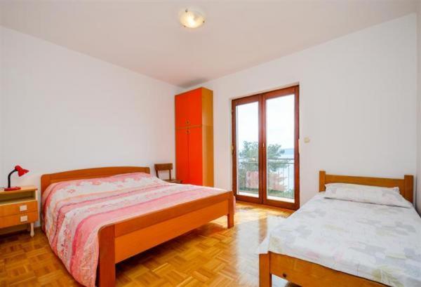 Postel nebo postele na pokoji v ubytování See view Apartment 2