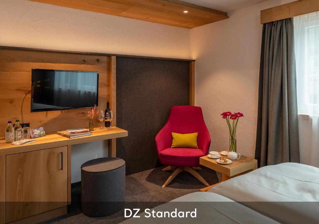 TV a/nebo společenská místnost v ubytování Sunstar Hotel Klosters