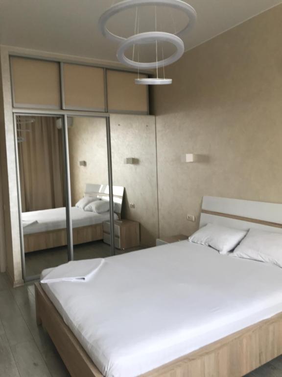 Postel nebo postele na pokoji v ubytování Apart Assistant on Smart Plaza