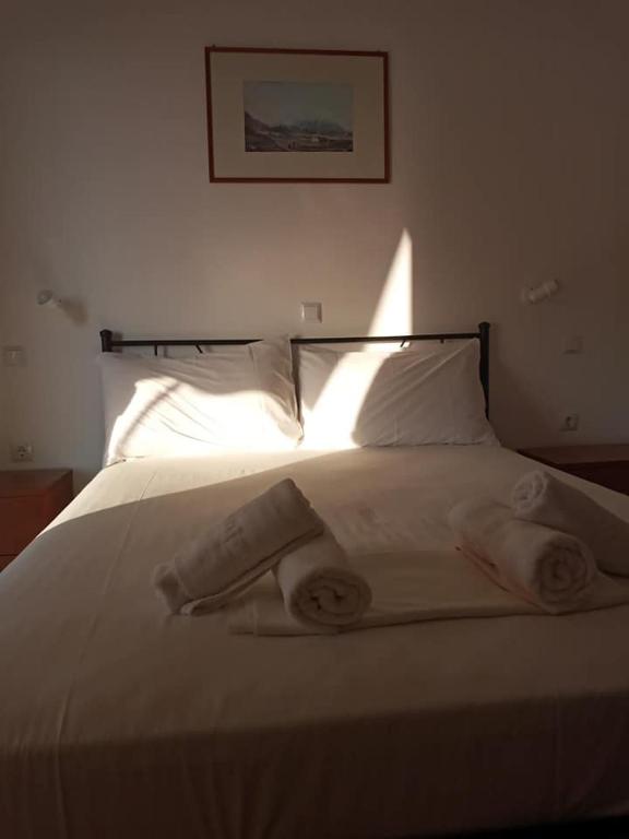 Letto o letti in una camera di FAROS