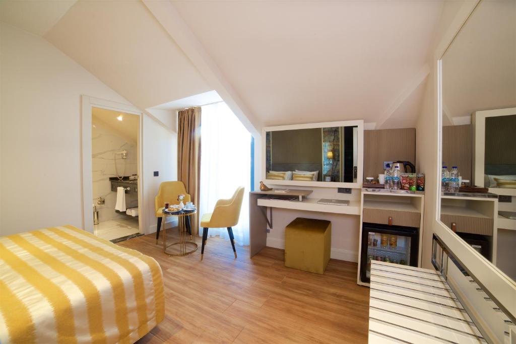 Postel nebo postele na pokoji v ubytování Icon Hotel Taksim