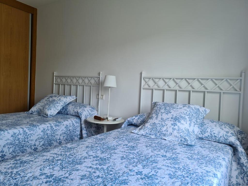 Postel nebo postele na pokoji v ubytování Mar azul en puerto azul