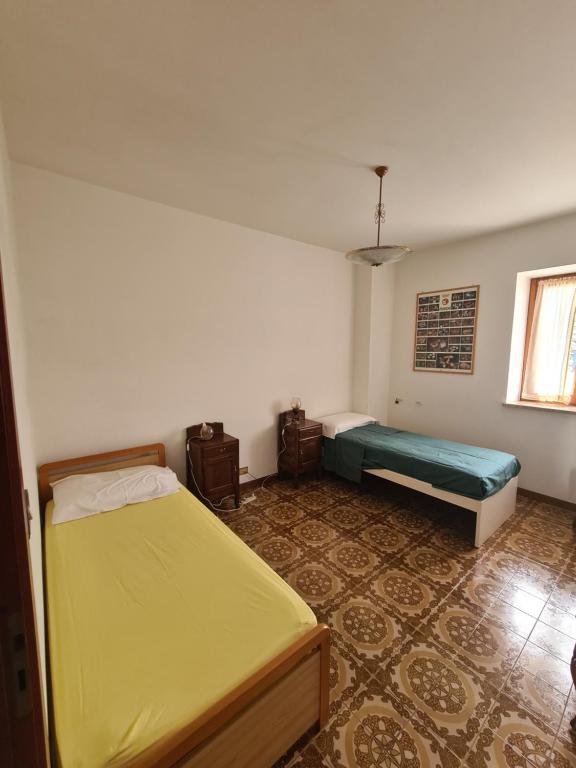 Postel nebo postele na pokoji v ubytování Appartmento Rustico Montagna Val Maira Castellaro
