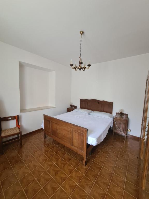 Postel nebo postele na pokoji v ubytování Appartmento Rustico Montagna Val Maira Castellaro
