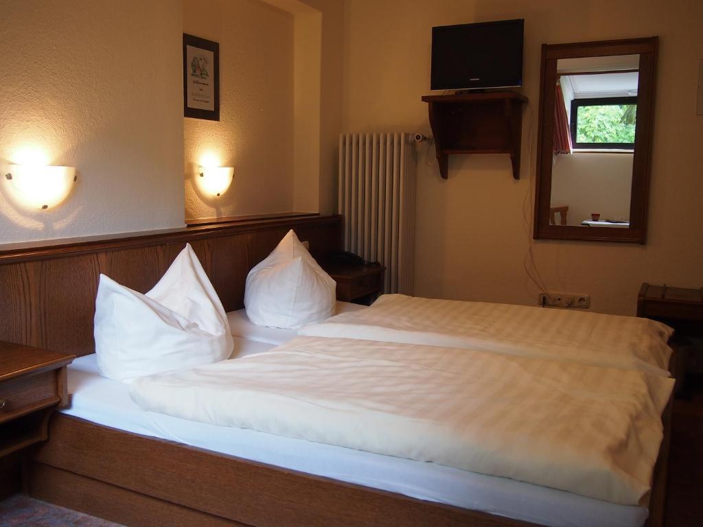 Postel nebo postele na pokoji v ubytování Hotel Köppeleck