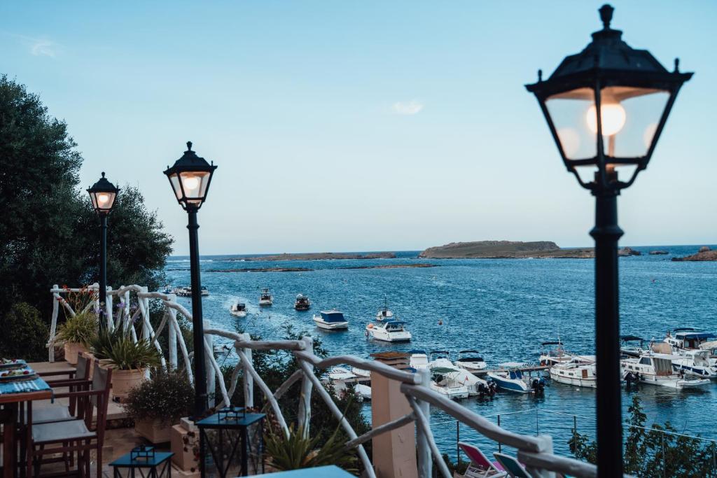 a view of a harbor with boats in the water at Menurka - Port d'Addaia in Port d'Addaia