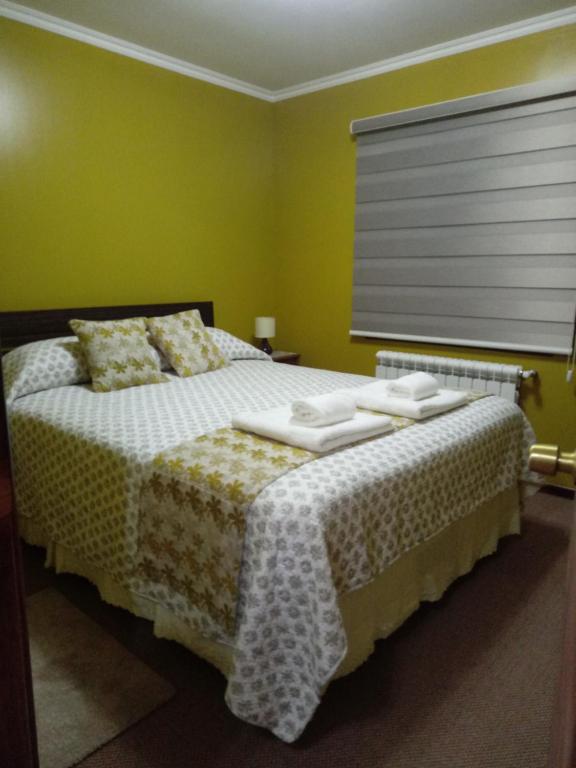 Postel nebo postele na pokoji v ubytování VALYAK rent apart hotel - Servicios Integrales