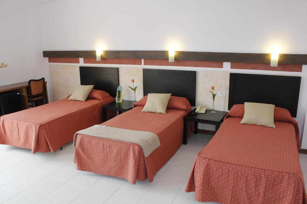 Posteľ alebo postele v izbe v ubytovaní 4Dreams Hotel Chimisay