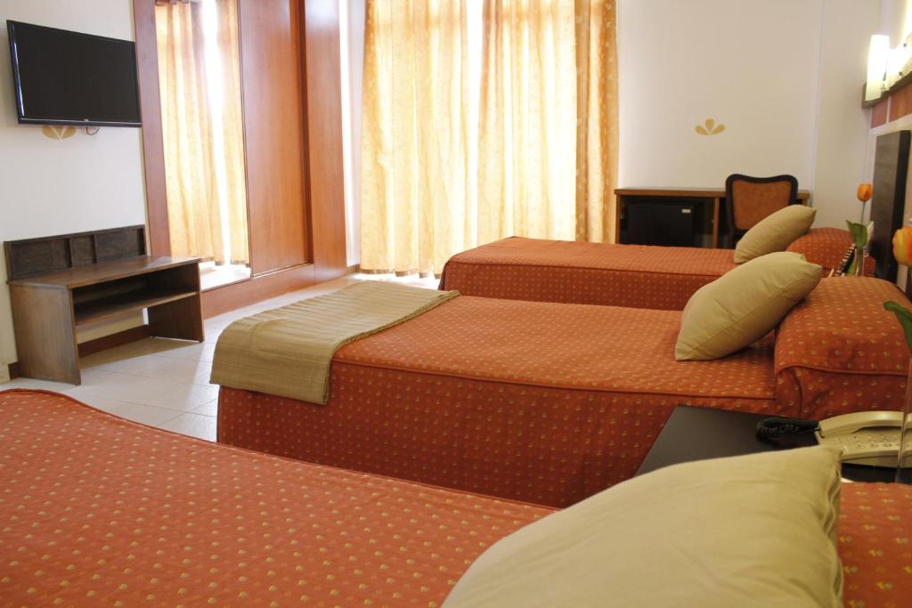 Posteľ alebo postele v izbe v ubytovaní 4Dreams Hotel Chimisay
