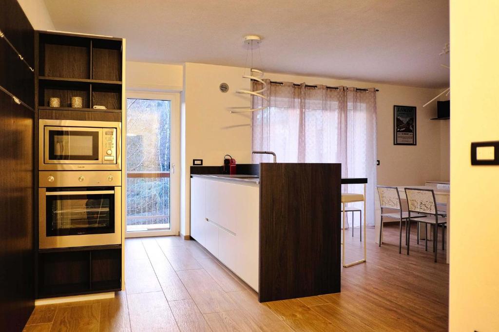 Una cocina o cocineta en Nuovo appartamento vacanze - CIR 0339
