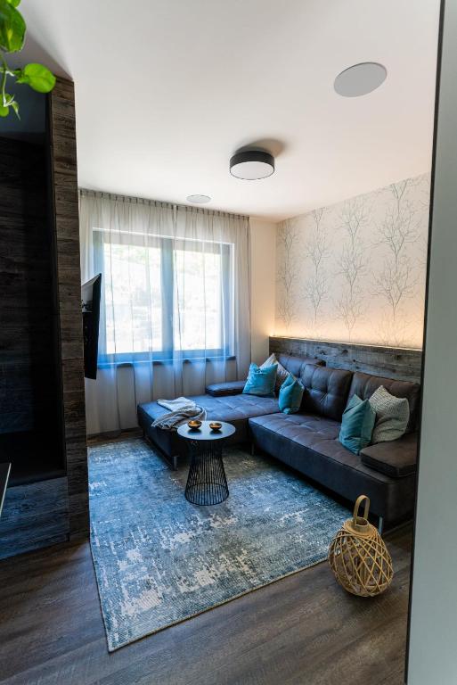 Posedenie v ubytovaní Dimensione Armonica - Elegance and comfort among lakes and hills