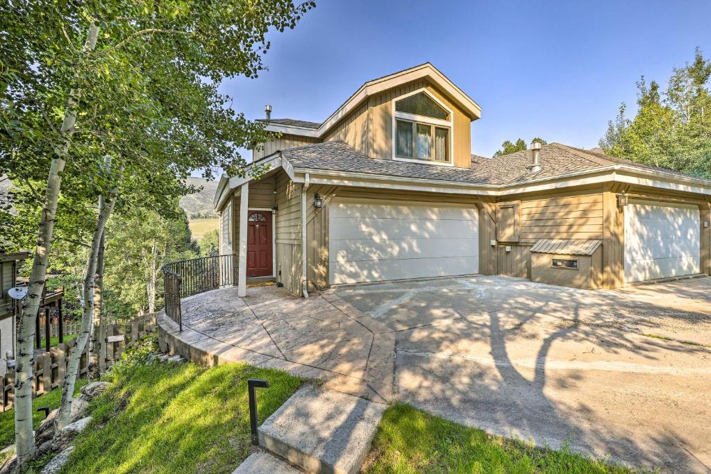 a house with a garage in the yard at Rocky Mountain Retreat 2 Mi to Beaver Creek! in Avon