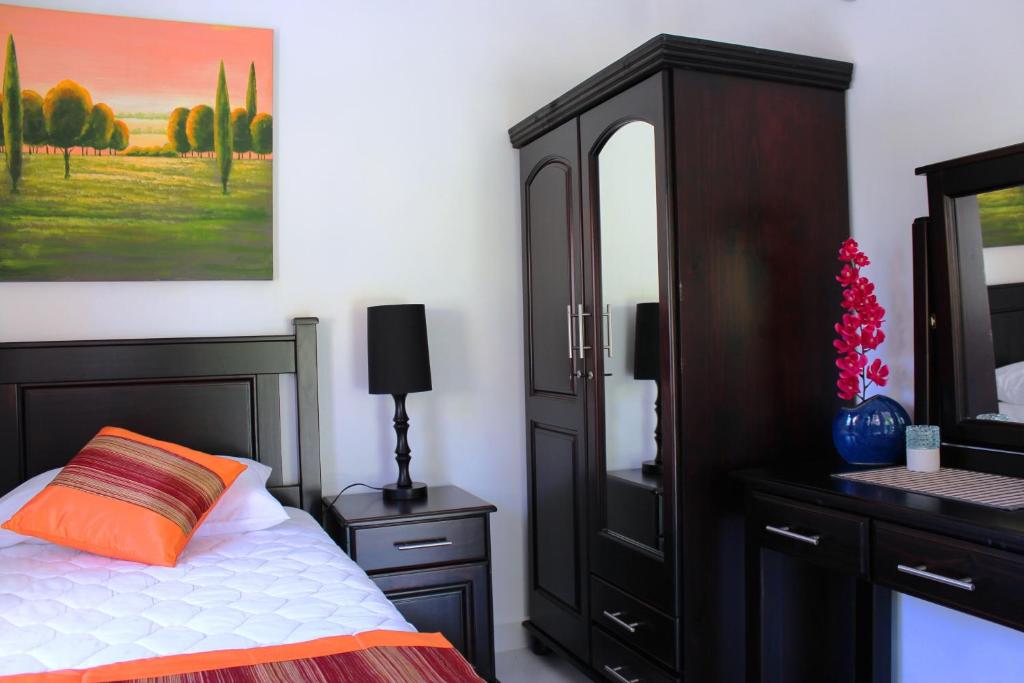 Postel nebo postele na pokoji v ubytování Sunset Cove Villa
