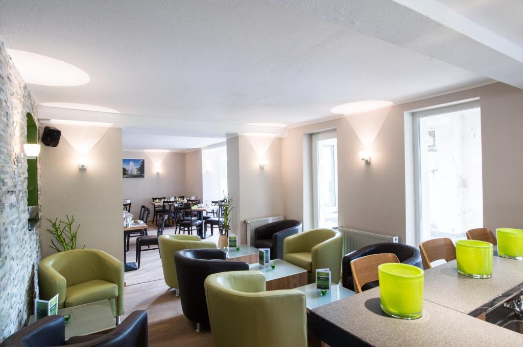 Posezení v ubytování Hotel am Herkules