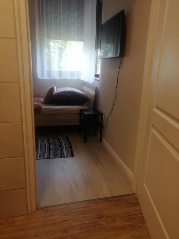 TV a/nebo společenská místnost v ubytování Cserke Apartmanház