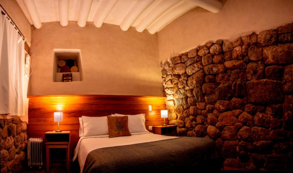 מיטה או מיטות בחדר ב-Nao Victoria Hostel