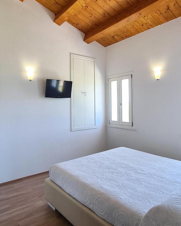 Postel nebo postele na pokoji v ubytování VillAlba Affittacamere