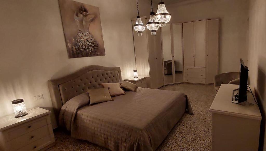 Posteľ alebo postele v izbe v ubytovaní LA CASA SOTTO IL CASTELLO