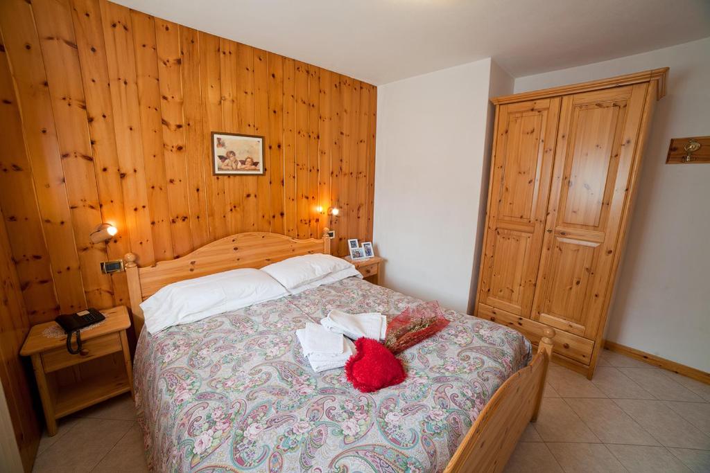 Postel nebo postele na pokoji v ubytování Chalet Bucaneve