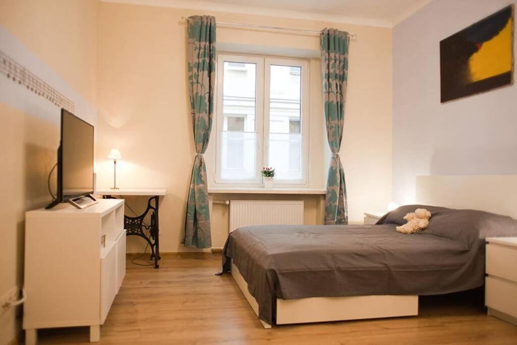 Posteľ alebo postele v izbe v ubytovaní Apartament Podwale by Your Freedom