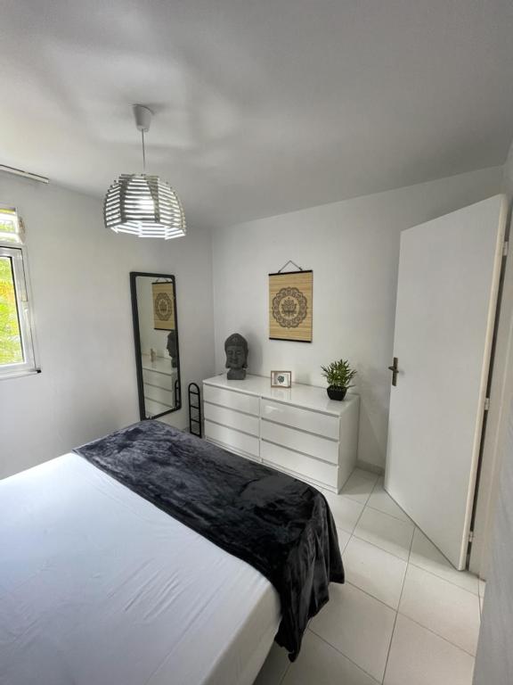 Postel nebo postele na pokoji v ubytování APPARTEMENT T2 ROUTE DES SALINES