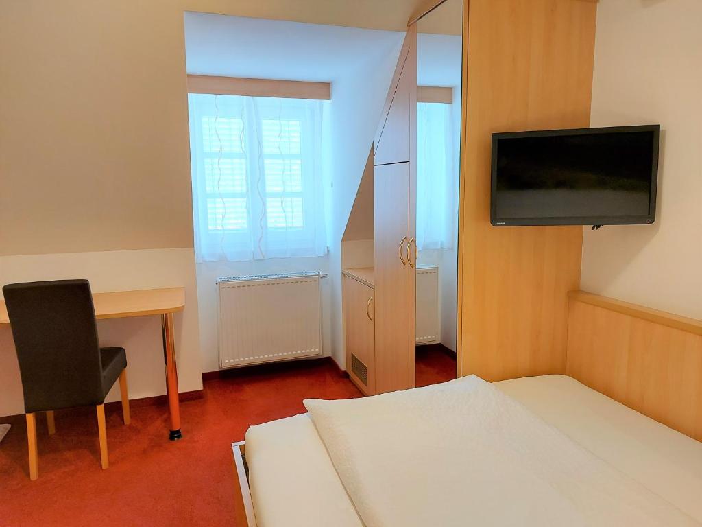Postel nebo postele na pokoji v ubytování Gästehaus Ferk - Frühstückspension, Bed & Breakfast