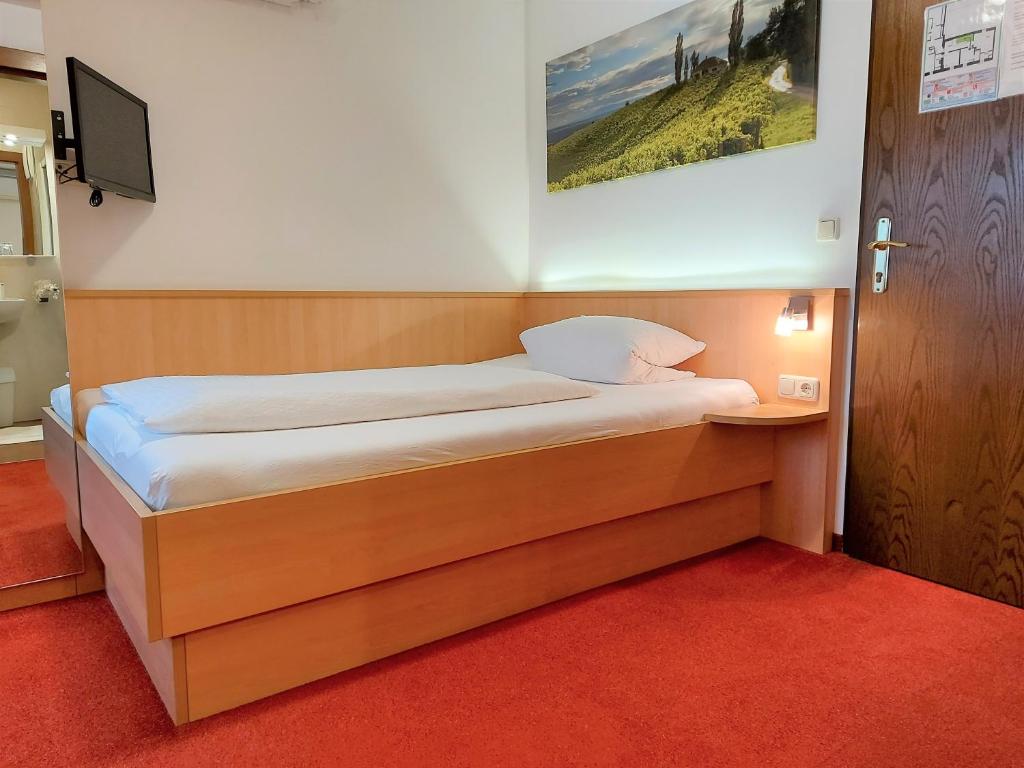 Postel nebo postele na pokoji v ubytování Gästehaus Ferk - Frühstückspension, Bed & Breakfast