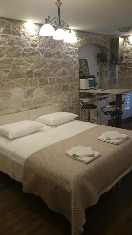 Posteľ alebo postele v izbe v ubytovaní Apartments Centrum Split