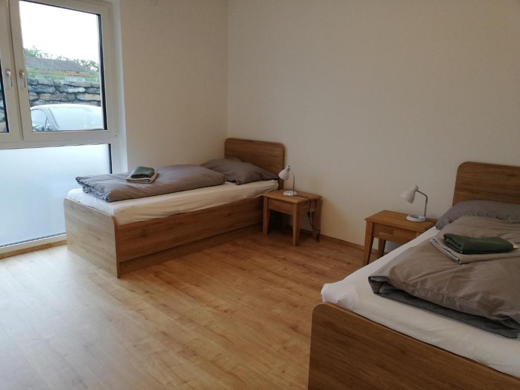 Postel nebo postele na pokoji v ubytování Ferienbungalows Vital